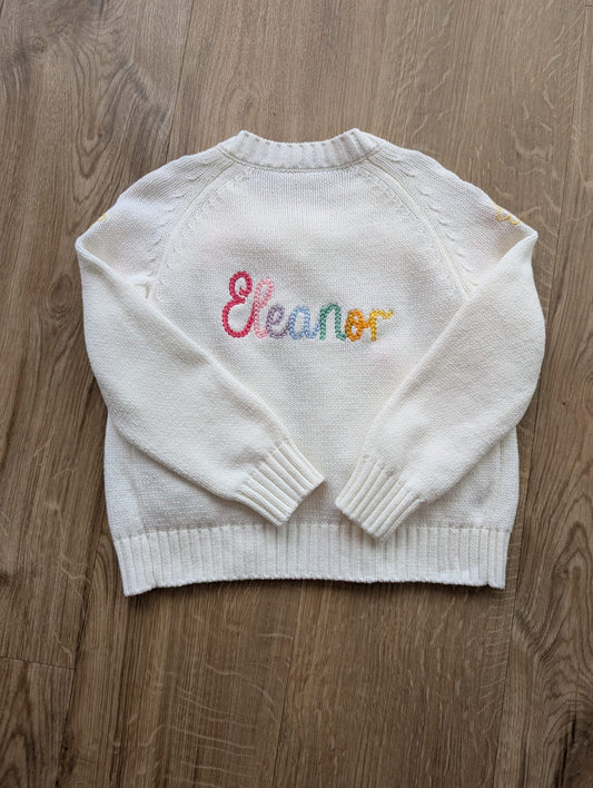 Cardigan with multi-colour rope stitched name