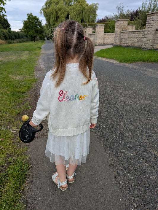 Cardigan with multi-colour rope stitched name